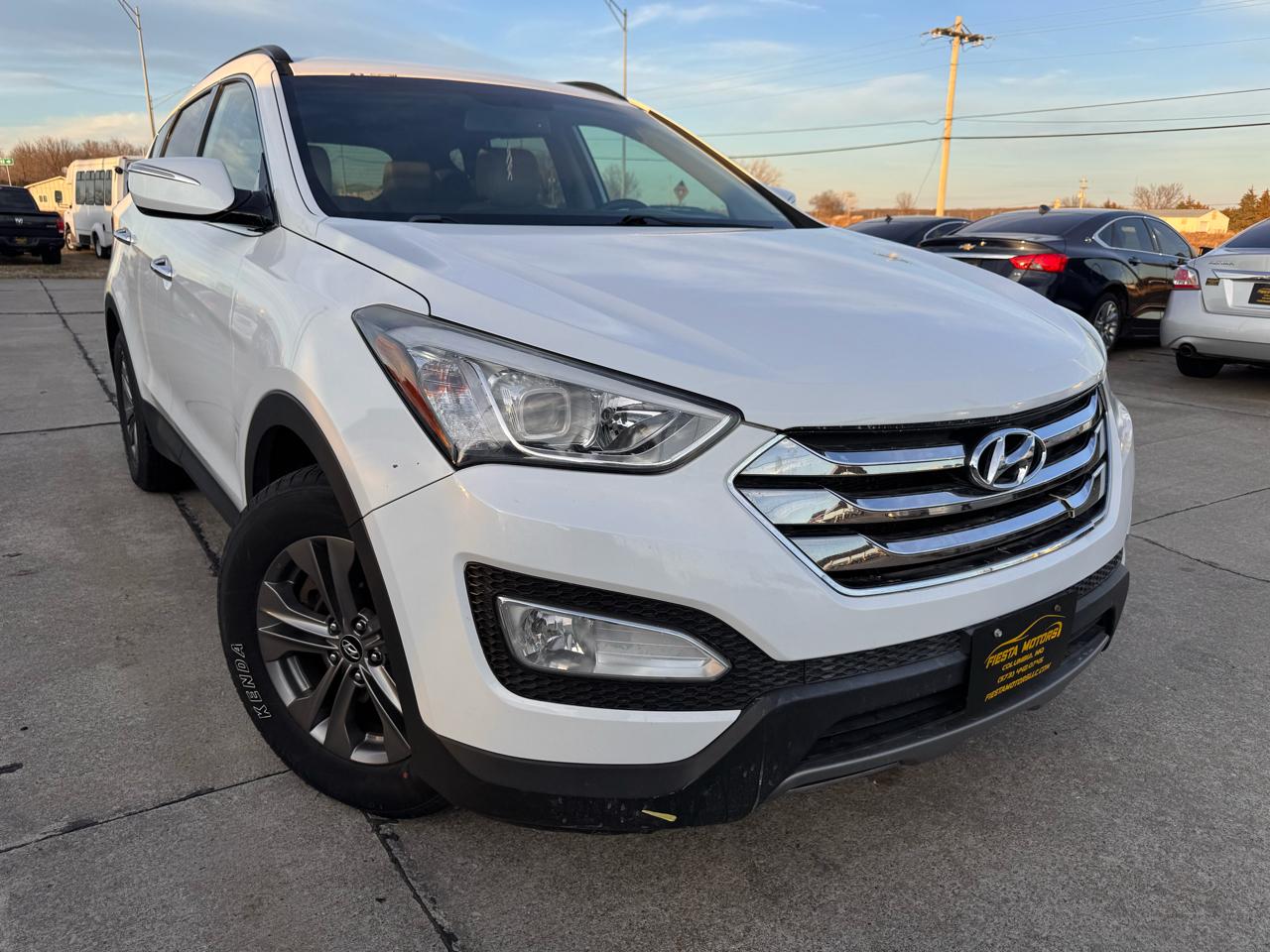 hyundai santa fe 2014 5XYZUDLB5EG218324 image hyundai santa fe 2014 5XYZUDLB5EG218324 image
